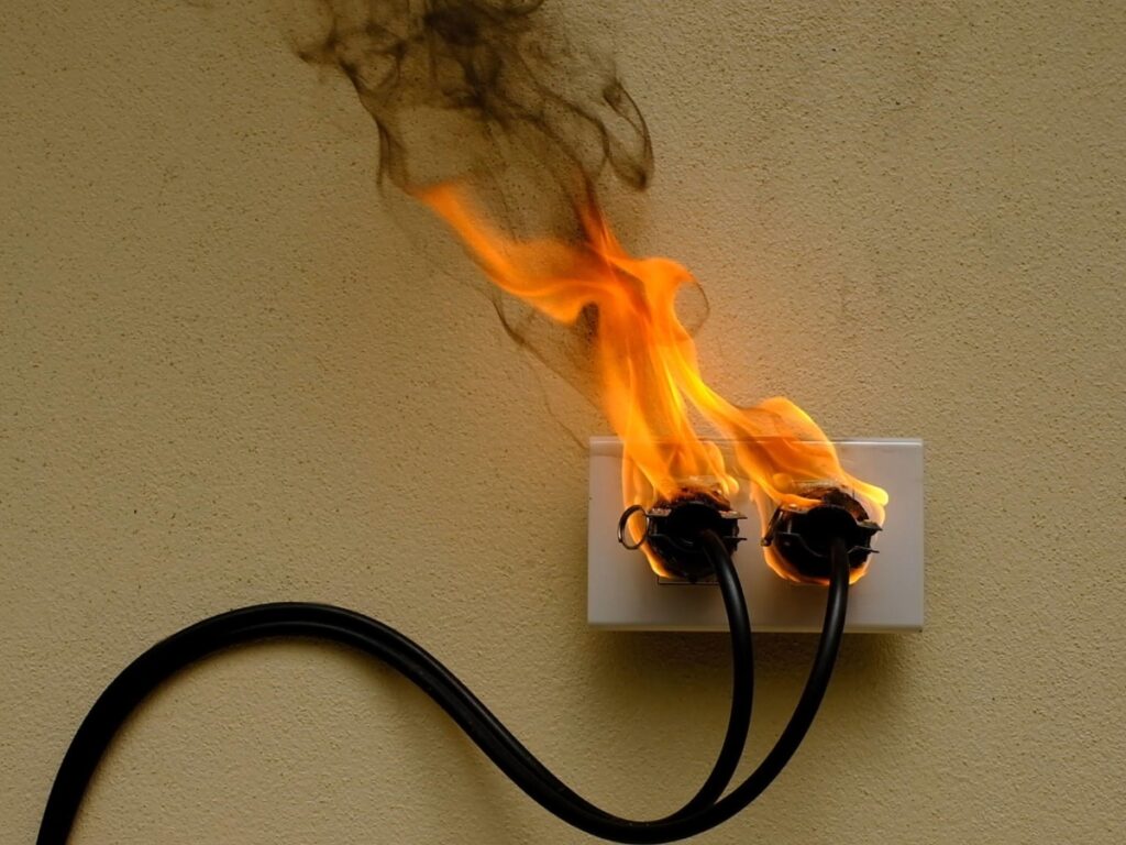 Power Point Hot to Touch? Stop Using It Immediately and Read This. 4 Burnt and discolored power point indicating overheating and electrical fault